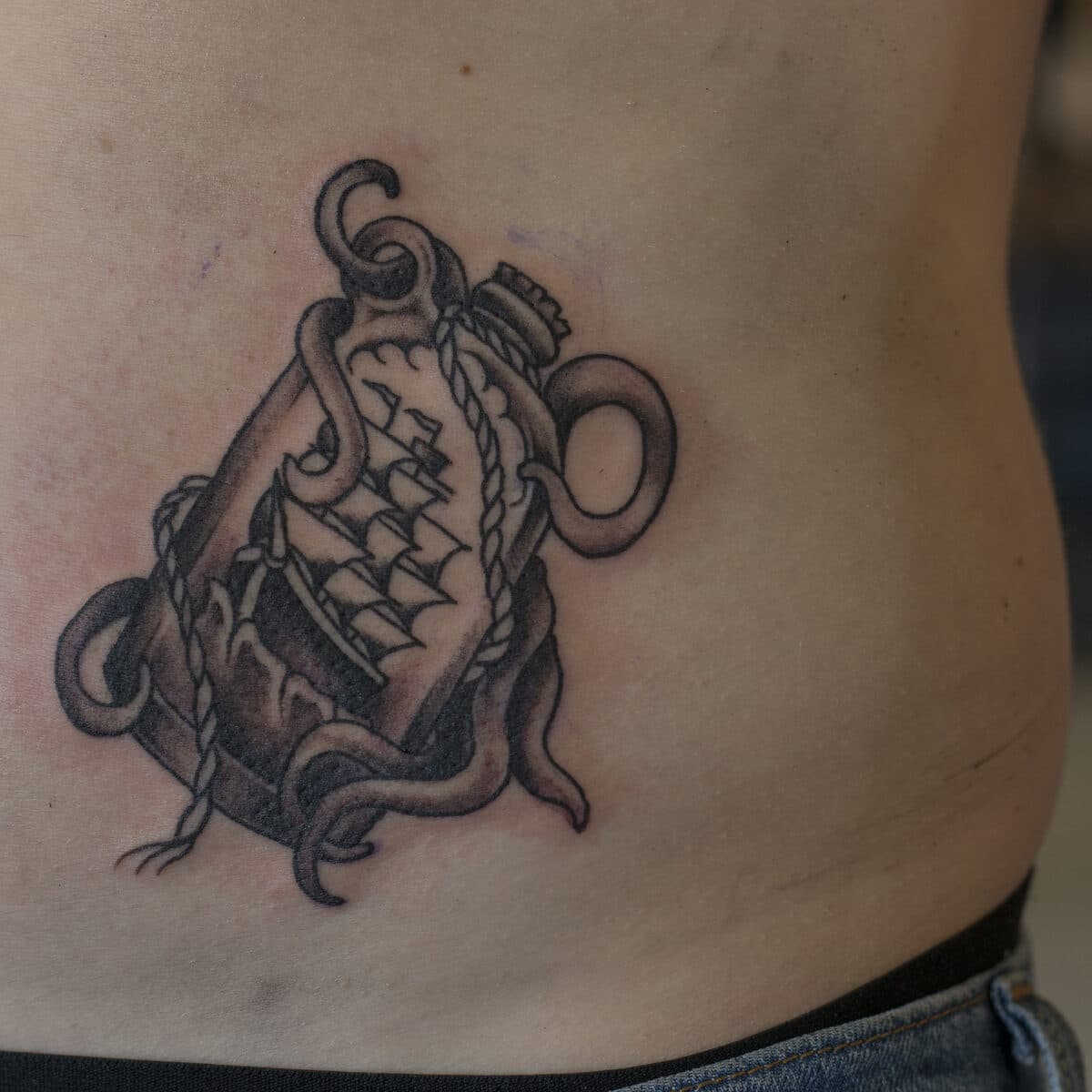 Ship, anchor & tentacles — lower back
